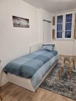 Posteľ alebo postele v izbe v ubytovaní HeberGenève : Aux pieds du château