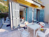 Balkón alebo terasa v ubytovaní Charmant 2 pièces avec terrasse, jardin et parking dans résidence avec piscine à Menton - FR-1-196-313