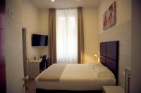 A television and/or entertainment centre at Hotel Fioralba