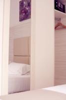 A bed or beds in a room at Hotel Fioralba