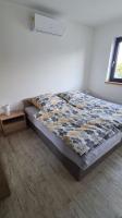 Posteľ alebo postele v izbe v ubytovaní Wake domek Blue House Januszkowice