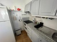 Kuchyň nebo kuchyňský kout v ubytování Apartamento Urb Oasis Park II Denia, las Marinas