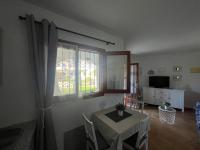 TV a/nebo společenská místnost v ubytování Apartamento Urb Oasis Park II Denia, las Marinas