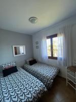 Postel nebo postele na pokoji v ubytování Apartamento Urb Oasis Park II Denia, las Marinas