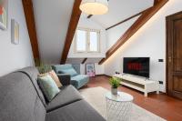 Telewizja i/lub zestaw kina domowego w obiekcie [Duomo - Pt.Romana - Bocconi] Top Floor Apartment