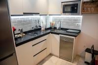 Kuchyň nebo kuchyňský kout v ubytování 180 Home Precioso apartamento con patio San Bernardo 4