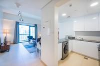 Expo Village Serviced Apartmentsにあるキッチンまたは簡易キッチン