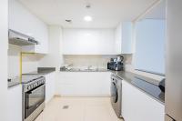 Expo Village Serviced Apartmentsにあるキッチンまたは簡易キッチン