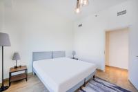 Expo Village Serviced Apartmentsにあるベッド