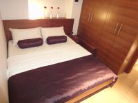 Łóżko lub łóżka w pokoju w obiekcie Apartments Villa Markiz