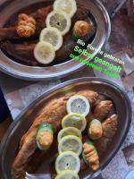 een kalkoen in een pan met schijfjes citroen erop bij Gasthof Müller in Winterberg