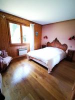 Łóżko lub łóżka w pokoju w obiekcie MAGNIFIQUE Appart/ 8 pers / 4 ch / Jardin / Vue MB
