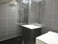 a bathroom with a shower and a sink and a toilet at Studio Piau-Engaly, 1 pièce, 4 personnes - FR-1-457-258 in Aragnouet
