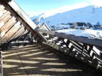 a wooden fence with snowy mountains in the background at Studio Piau-Engaly, 1 pièce, 4 personnes - FR-1-457-258 in Aragnouet