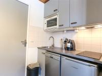 Een keuken of kitchenette bij Appartement Val Thorens, 3 pi&egrave;ces, 5 personnes - FR-1-637-13