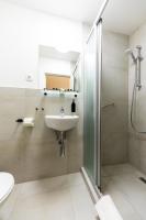 Kúpeľňa v ubytovaní Adagio Downtown Rooms