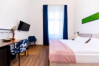 Posteľ alebo postele v izbe v ubytovaní Adagio Downtown Rooms