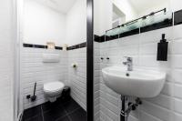 Kúpeľňa v ubytovaní Adagio Downtown Rooms