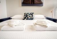 A bed or beds in a room at Artsy and elegant apartment near Pantheon