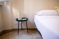 A bed or beds in a room at Artsy and elegant apartment near Pantheon