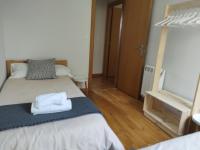 Postel nebo postele na pokoji v ubytování A casa da Pena Vixia