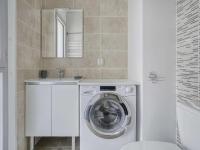 a bathroom with a washing machine and a sink at Appartement Saint-Jean-de-Luz, 2 pièces, 4 personnes - FR-1-4-586 in Saint-Jean-de-Luz