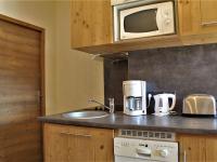 A cozinha ou cozinha compacta de Appartement Risoul, 2 pi&egrave;ces, 5 personnes - FR-1-330-446