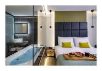 Posteľ alebo postele v izbe v ubytovaní Platinum Suites