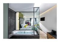 Posteľ alebo postele v izbe v ubytovaní Platinum Suites