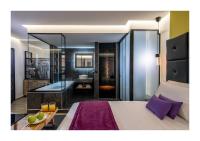 Posteľ alebo postele v izbe v ubytovaní Platinum Suites