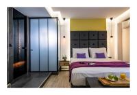 Posteľ alebo postele v izbe v ubytovaní Platinum Suites