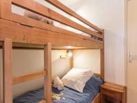 a bunk bed with a teddy bear on the bottom bunk at Appartement Le Monêtier-les-Bains, 2 pièces, 6 personnes - FR-1-330F-35 in Le Monêtier-les-Bains