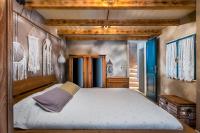 Posteľ alebo postele v izbe v ubytovaní Rustic Cozy house Pupy
