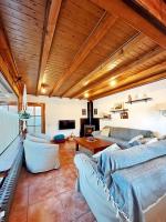 A seating area at Apartaments Cel i Fusta