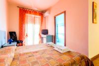 Posteľ alebo postele v izbe v ubytovaní Bosa Guest House
