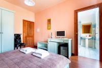 Posteľ alebo postele v izbe v ubytovaní Bosa Guest House