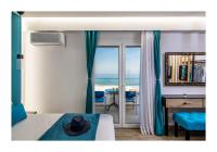 Posteľ alebo postele v izbe v ubytovaní Platinum Suites