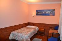 Posteľ alebo postele v izbe v ubytovaní Hotel Skaut
