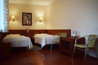 Posteľ alebo postele v izbe v ubytovaní Hotel Skaut