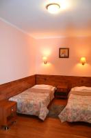 Posteľ alebo postele v izbe v ubytovaní Hotel Skaut