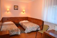 Posteľ alebo postele v izbe v ubytovaní Hotel Skaut