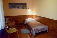 Posteľ alebo postele v izbe v ubytovaní Hotel Skaut