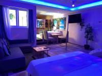 TV a/nebo společenská místnost v ubytování Sosua Inn Hotel