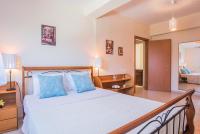A bed or beds in a room at Diogenis villa