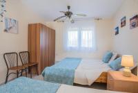 A bed or beds in a room at Diogenis villa
