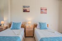 A bed or beds in a room at Diogenis villa