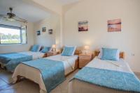 A bed or beds in a room at Diogenis villa