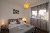 Posteľ alebo postele v izbe v ubytovaní Apartman Fuma