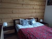 Posteľ alebo postele v izbe v ubytovaní Apartament Markówka w Kościelisku
