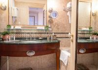 a bathroom with a sink and a mirror at The Pucic Palace in Dubrovnik
